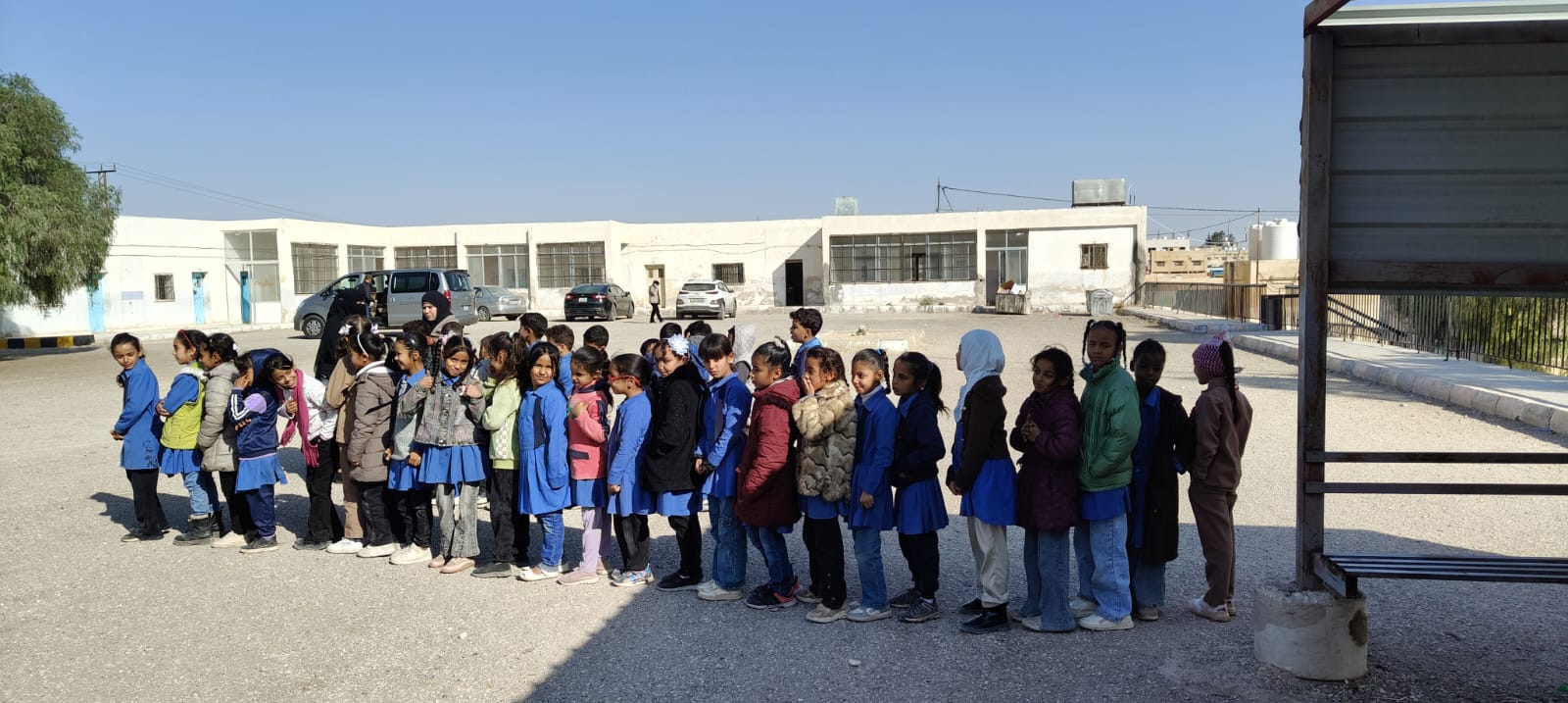 Children arriving for a free medical day
